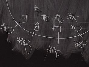 Circle of 5ths written on a chalkboard