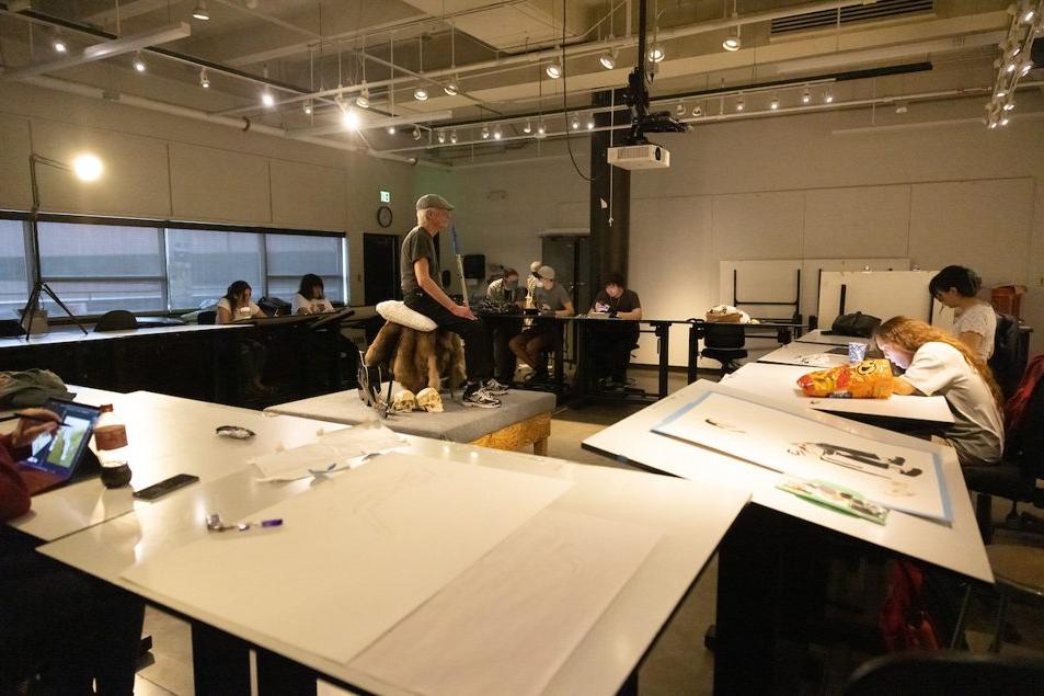Students works in the studio during the course called 
